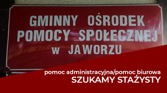 Tablica z napisem Gminny Ośrodek Pomocy Społecznej, poniżej napis szukamy stażysty